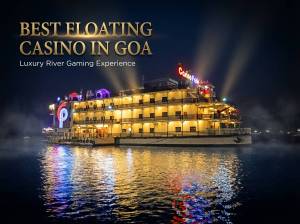 Casino Pride floating casino glowing at night on Mandovi River Goa with golden reflections